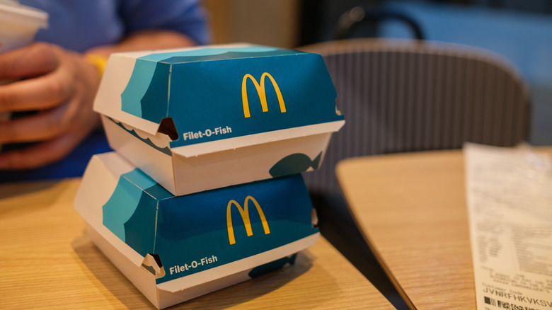 Two unopened boxes of Filet-O-Fish sandwiches stacked on top of each other