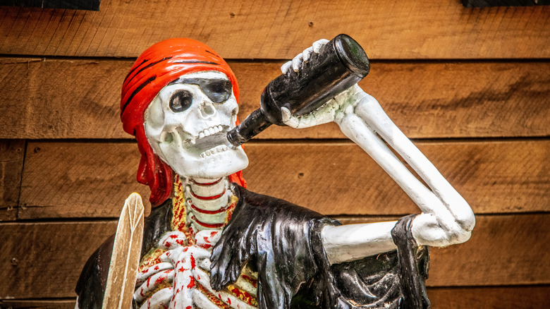 Skeleton pirate drinking a beer