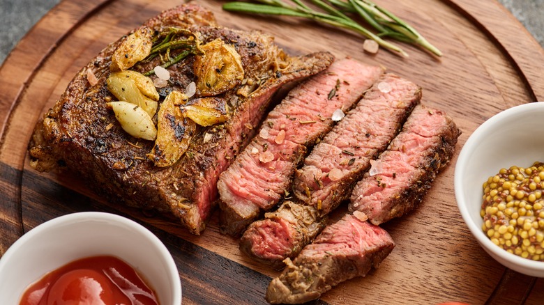 Steak pieces on cutting board