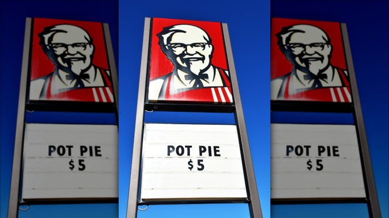 KFC sign with Colonel Sanders advertising $5 pot pie