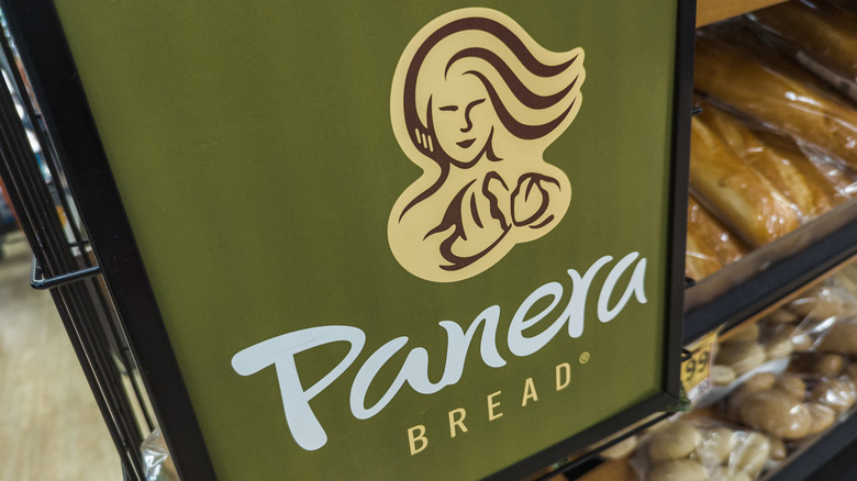 Bags of bread behind Panera sign