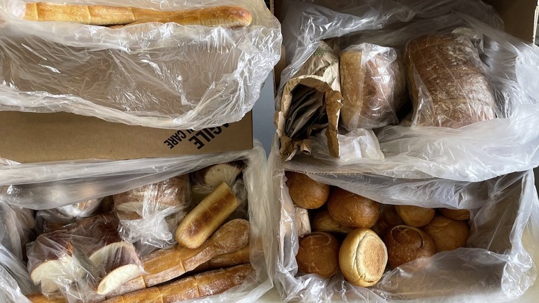 Boxes filled with donated Panera bread wrapped in plastic