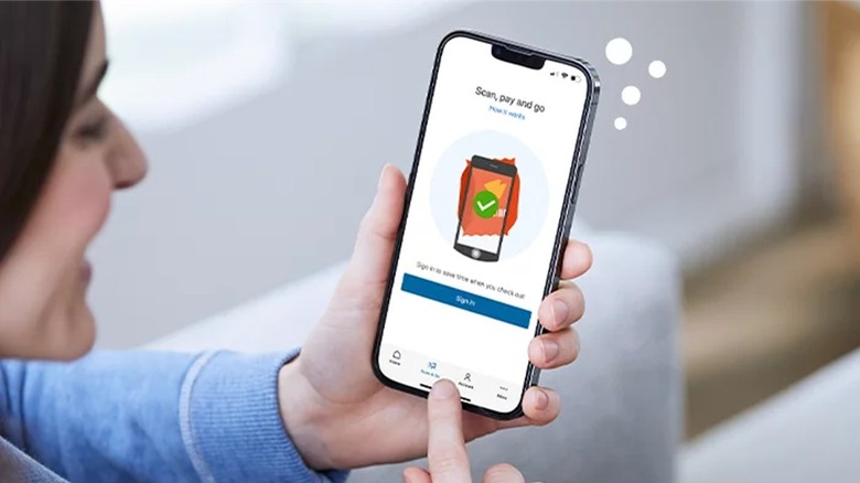 woman using Scan And Go app