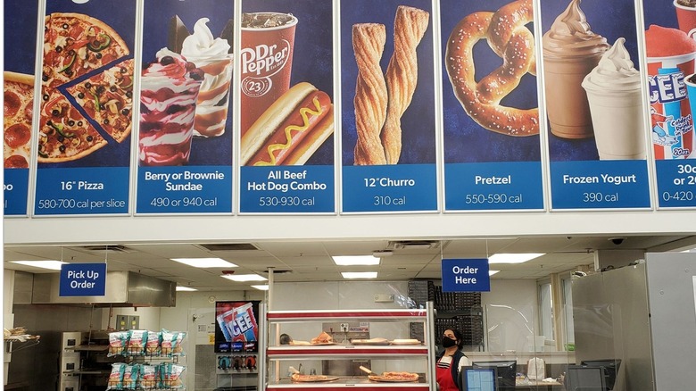 A Sam's Club snack menu above the order counter