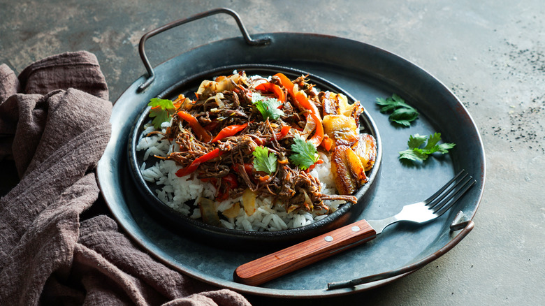 Ropa vieja served in skillet