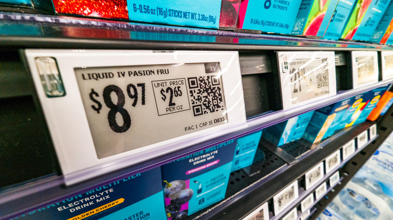 Closeup of a digital price tag for Liquid IV inside a Walmart supercenter