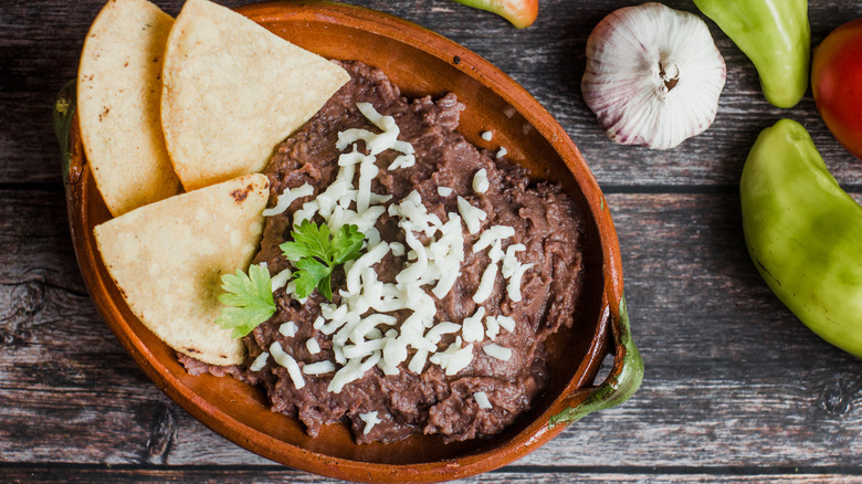 A bowl of refried beans