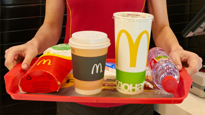 mcdonald's employee serving food