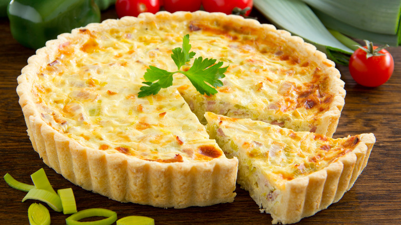 quiche lorraine on a wooden board