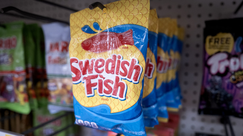 Bag of Swedish Fish candy hanging in candy aisle