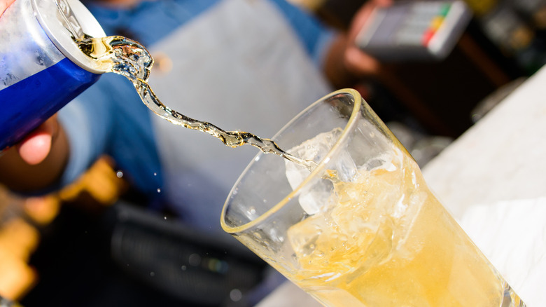 Red Bull being poured into a glass
