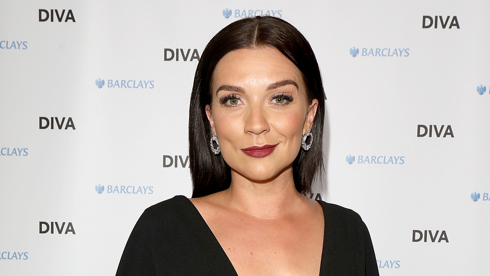 Candice Brown smirking