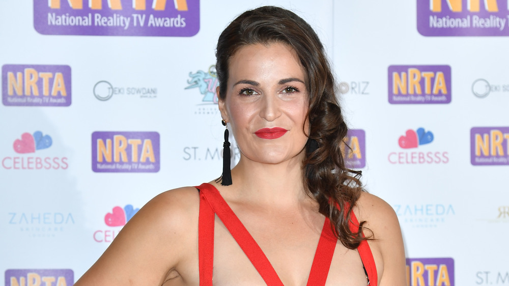 Sophie Faldo in a red dress