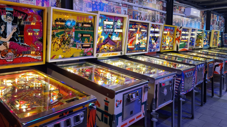 Row of old-school pinball machines
