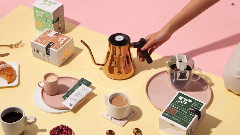 Copper Cow Coffee boxes and creamers with kettle