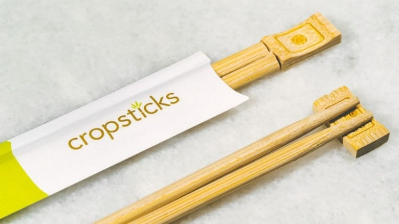 Pauzinhos de cropsticks e stand