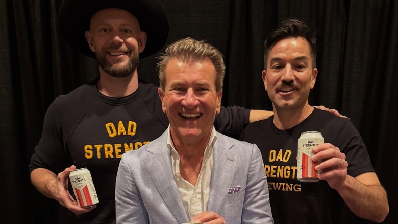 Ryan Kutscher and Craig Carey with Shark investor Robert Herjavec