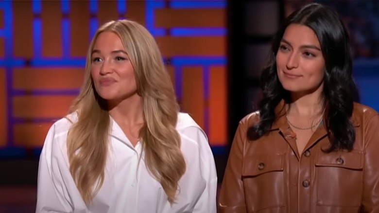 Zoya Biglary and Alix Traeger smiling on Shark tank stage