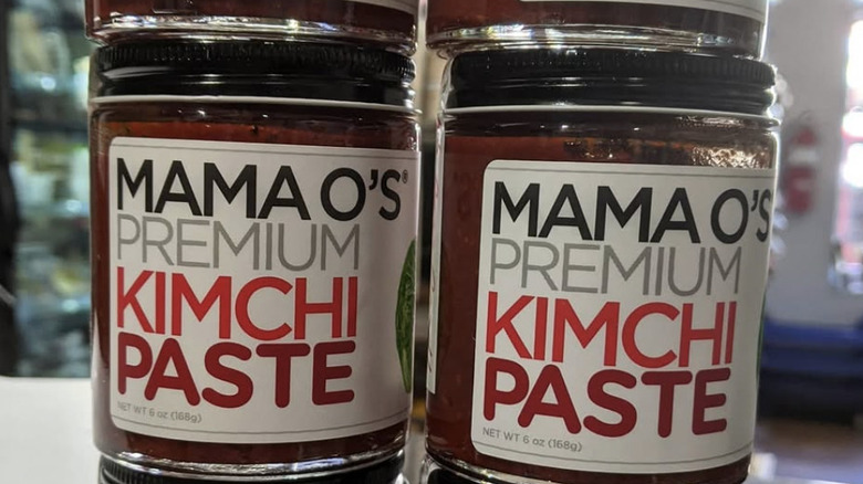A stack of Mama O's kimchi paste