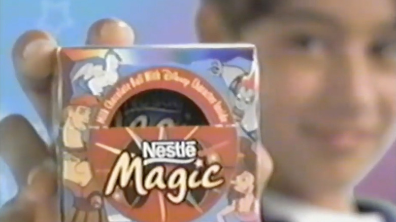 Kid holding Nestle Magic Ball