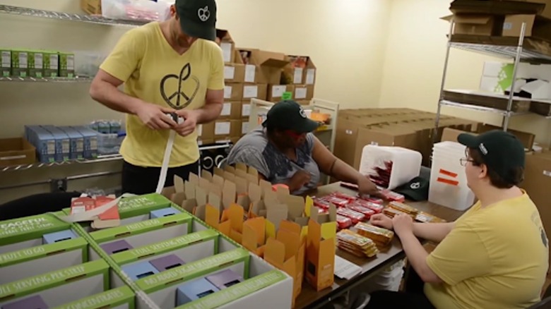 Peaceful Fruits facility with employees
