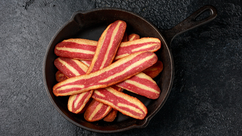 vegan bacon in a cast iron skillet