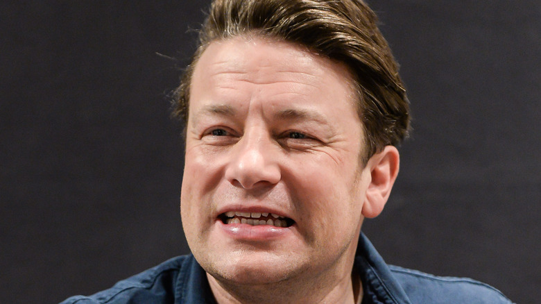 Jamie Oliver grins