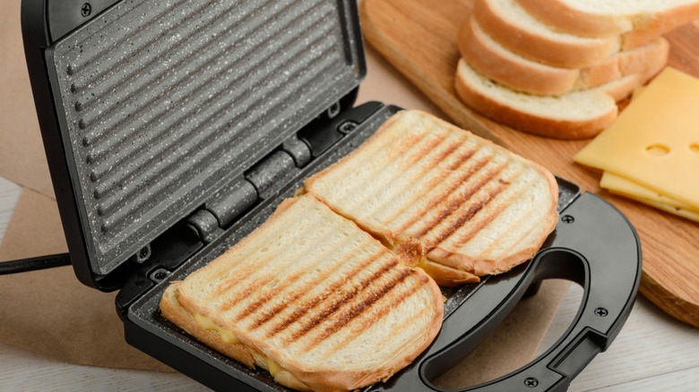 Sandwiches inside a panini press 