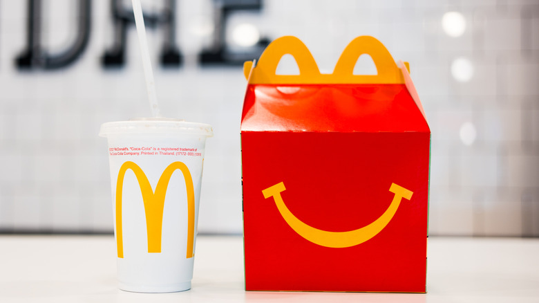 McDonald's Happy Meal and drink on counter