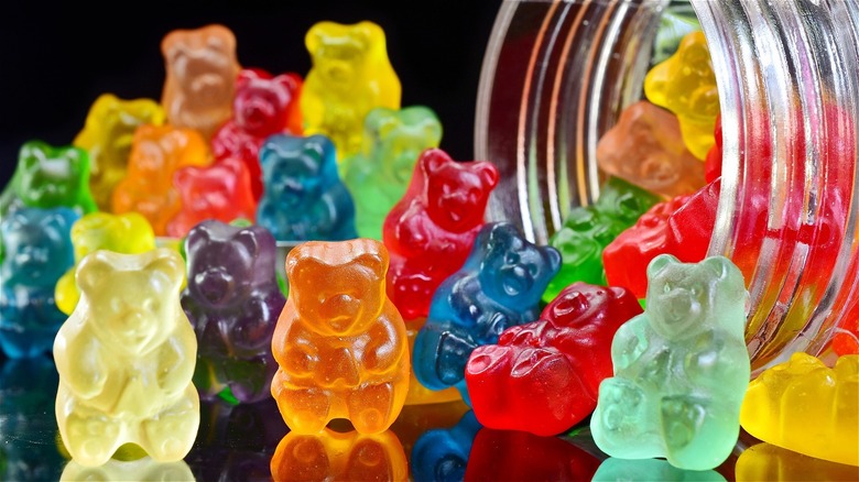 colorful gummy bears out of jar