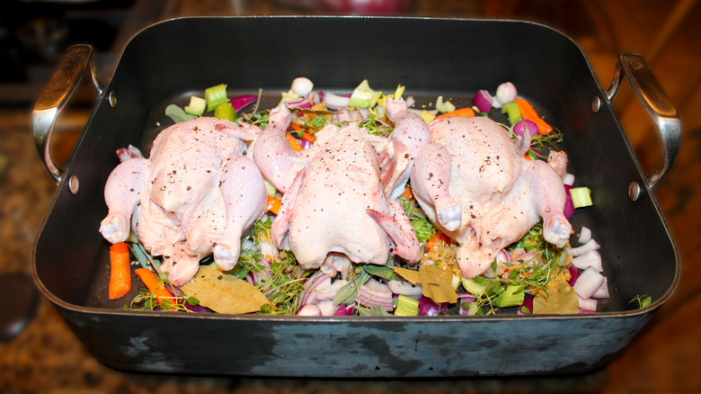 Cornish hens in roasting pan