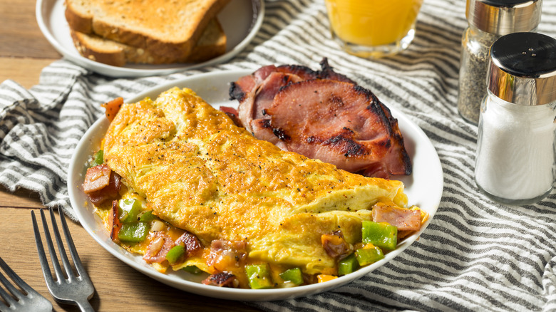 Denver omelet with toast ham and orange juice