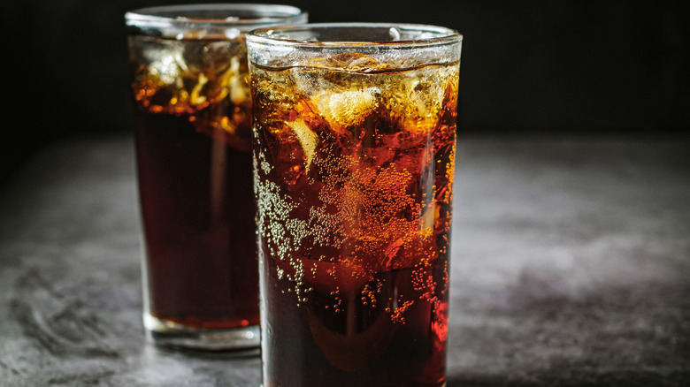 Carbonated iced cola drink in a glass