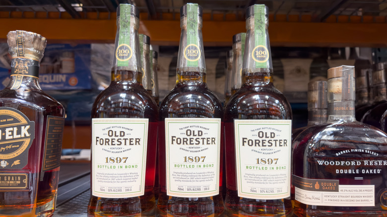 Bottles of Old Forester 1897 on liquor store shelf