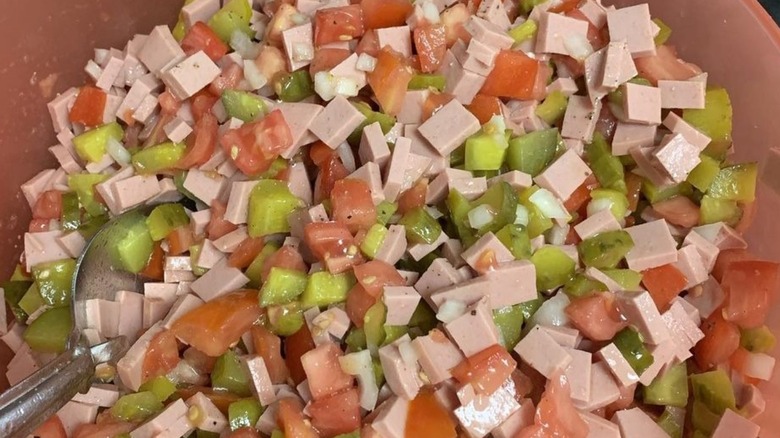 Bologna salad in a brown bowl