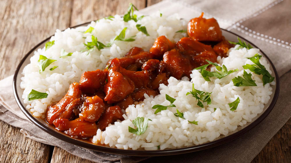 Bourbon chicken on a plate with rice