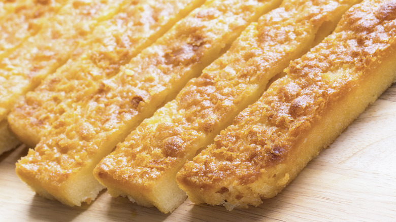 Butter mochi cut into strips