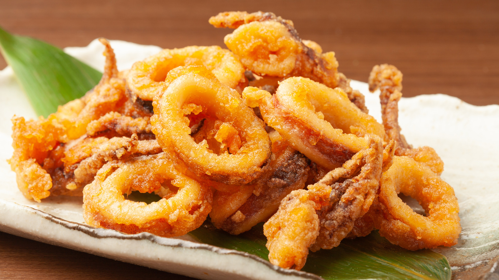 Premium Photo | Baked breaded calamari or octopus rings flat lay