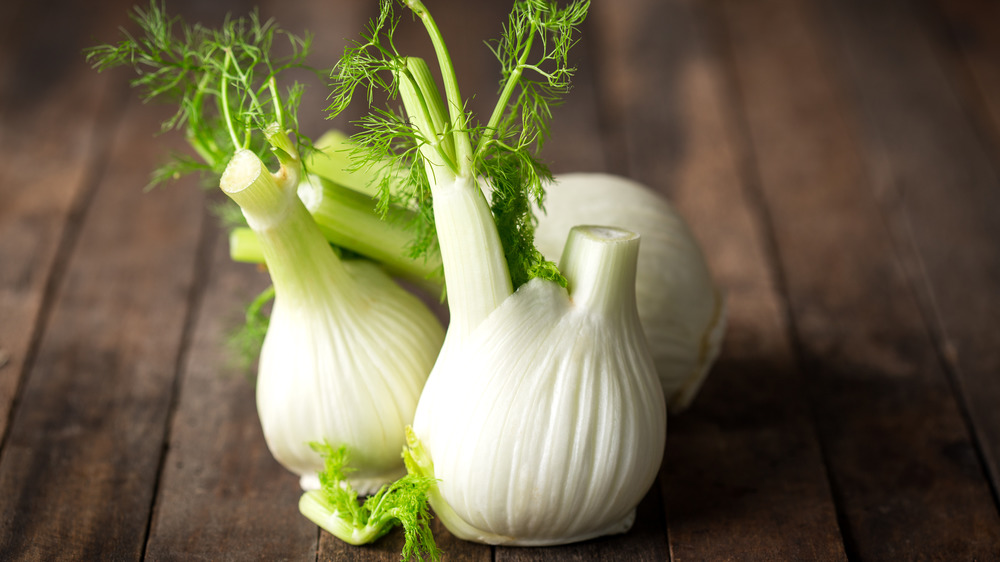 Fennel bulbs on boards