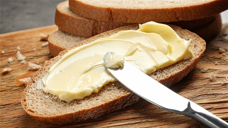 butter spread on bread