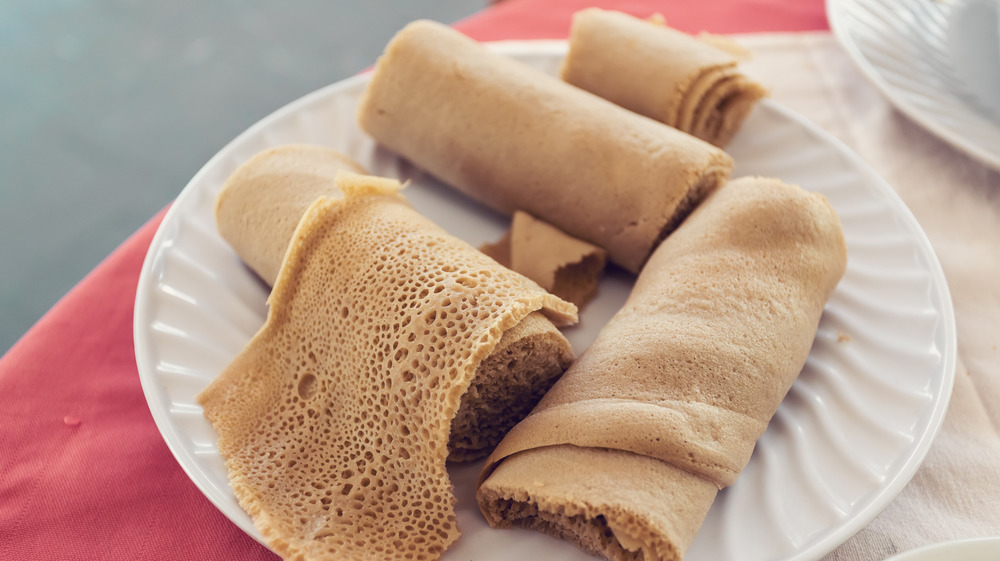 Injera on a white plate