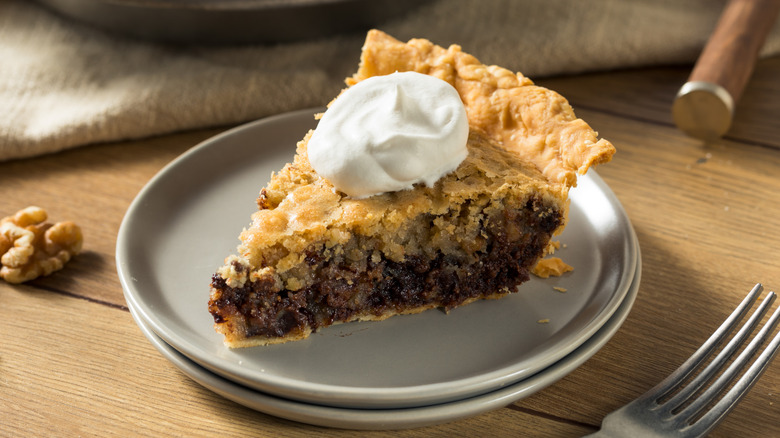 Slice of pie with whipped cream