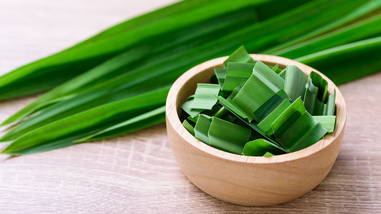 Whole and cut pandan leaves