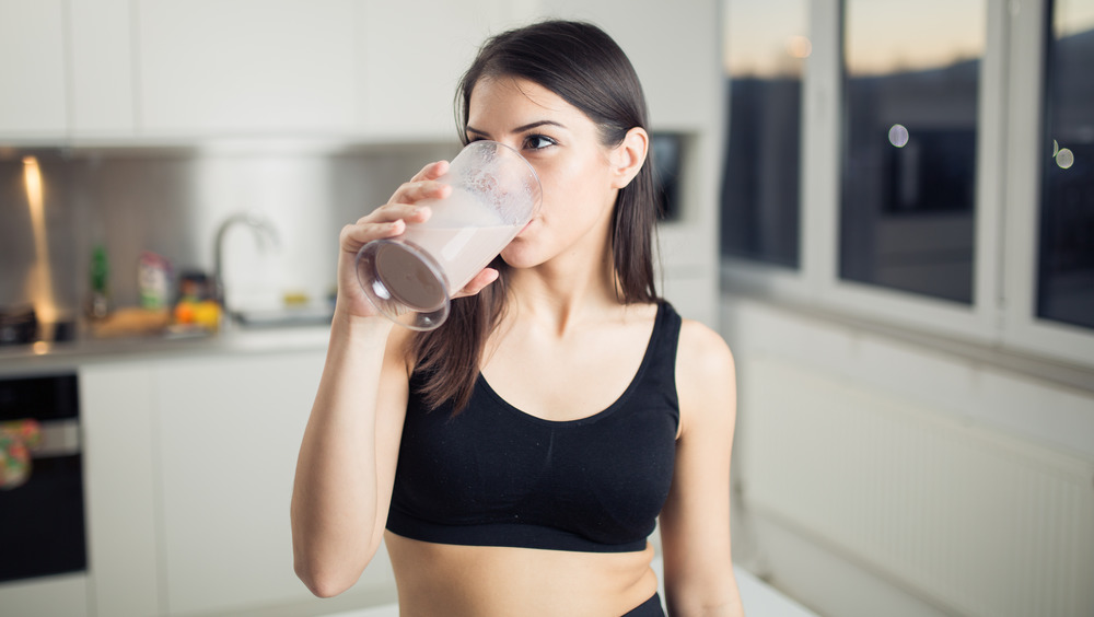 Woman drinking protein shake