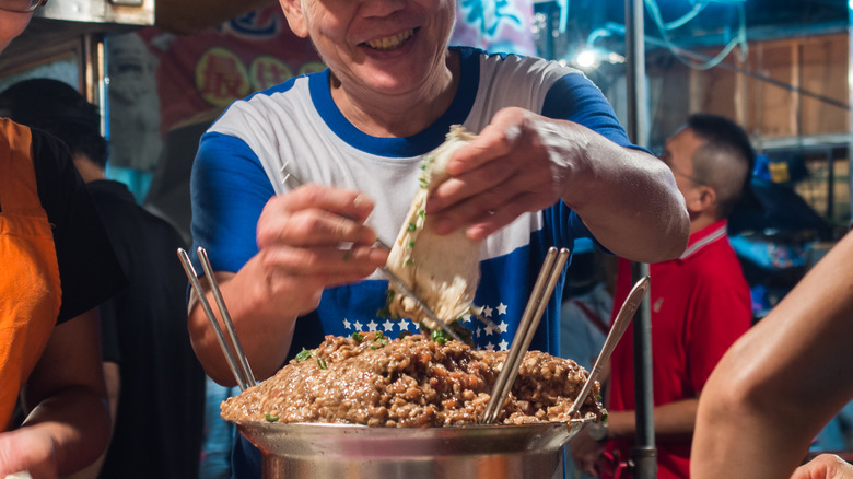 Cooks at Taiwanese market