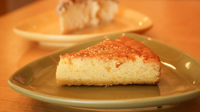 A slice of quesadilla salvadoreña on a plate