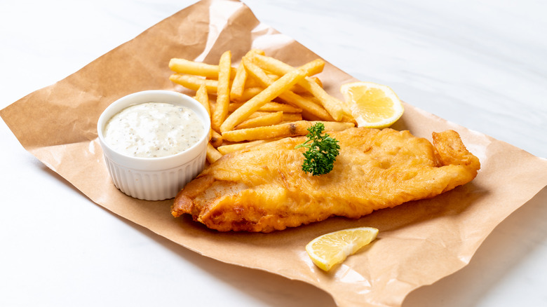 Plate of fish and chips with tartar sauce