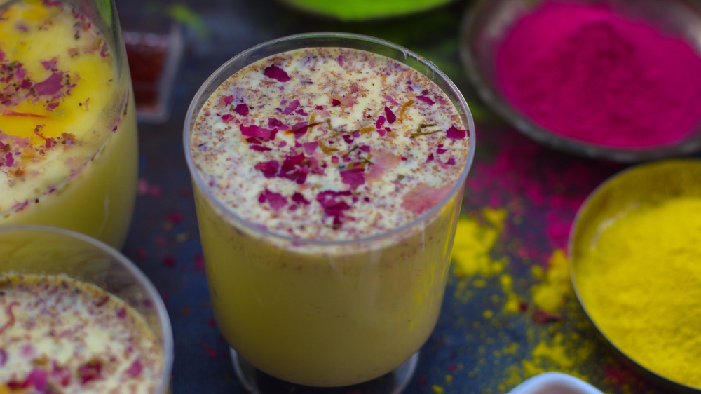 Thandai in a glass with roses