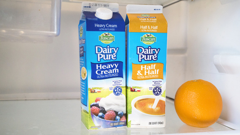 Cartons of half and half in refrigerator