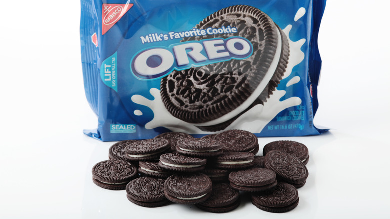 Many Oreo cookies in front of an Oreo package